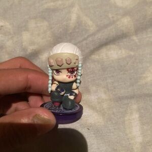 Anime Character Figurine with White and Purple Accents